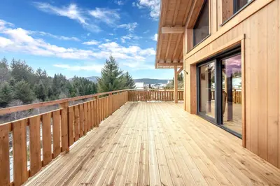Balcon ou terrasse dans l'établissement Chalet L'Echappée Belle, luxury with spa and sauna