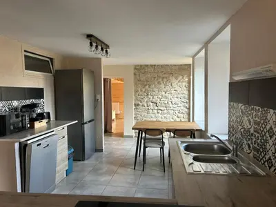 Cuisine ou kitchenette dans l'établissement La Ferme