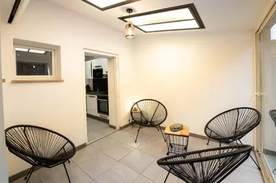 Coin salon dans l'établissement Gite Le ptit plus à Gérardmer