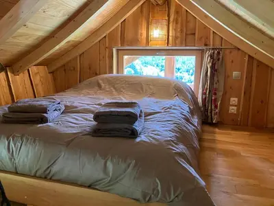Un ou plusieurs lits dans un hébergement de l'établissement Cabane insolite Les Vargottes