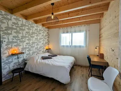Un ou plusieurs lits dans un hébergement de l'établissement Chalet Nature avec Sauna et WIFI près Gérardmer - FR-1-589-777