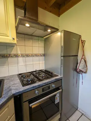 Cuisine ou kitchenette dans l'établissement Chalet bois et pierre
