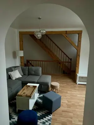 Coin salon dans l'établissement Beau duplex proche centre