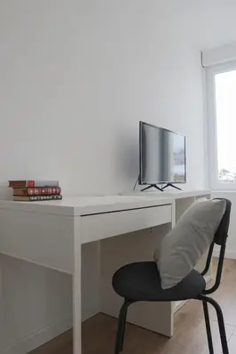 Télévision ou salle de divertissement dans l'établissement Le carré, appartement de ville