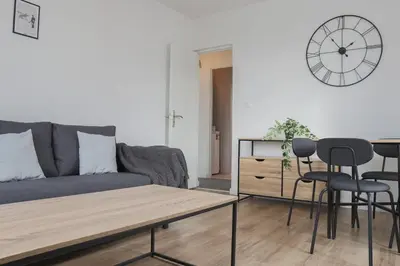 Coin salon dans l'établissement Le carré, appartement de ville