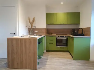 Cuisine ou kitchenette dans l'établissement De l'herbe jusqu'aux genoux - appartement 60 m2