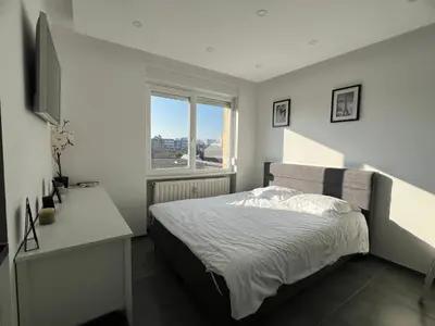 Un ou plusieurs lits dans un hébergement de l'établissement Nice Studio 2 pers Near Basel stationnement gratuit