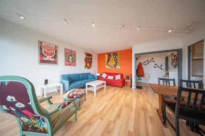 Coin salon dans l'établissement Marne 29 Logement Mulhouse Proche Tram Autoroute