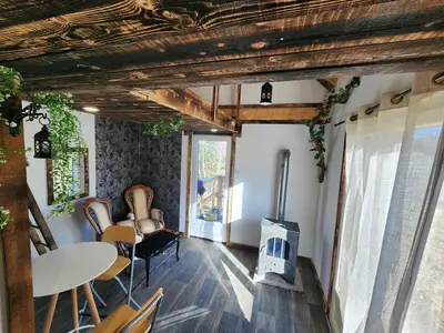 Coin salon dans l'établissement Chalet de la Comté