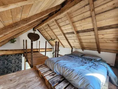 Un ou plusieurs lits dans un hébergement de l'établissement Chalet de la Comté