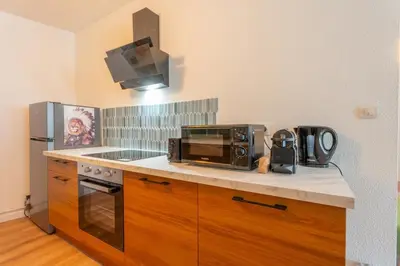 Cuisine ou kitchenette dans l'établissement Centre Parking gratuit Bars restaurants