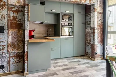 Cuisine ou kitchenette dans l'établissement Le BH 22