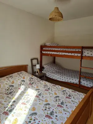 Un ou plusieurs lits dans un hébergement de l'établissement Joli appartement 4 personnes à la campagne