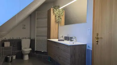 Salle de bains dans l'établissement L'Escale du Centre Alsace