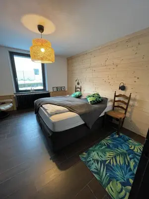 Un ou plusieurs lits dans un hébergement de l'établissement Lysgaard Cosy Cottage