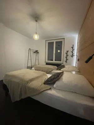 Un ou plusieurs lits dans un hébergement de l'établissement Lysgaard Cosy Cottage