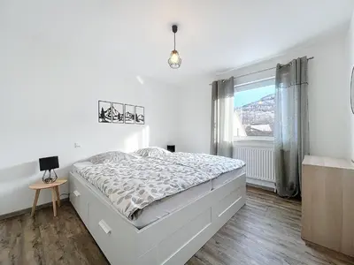 Un ou plusieurs lits dans un hébergement de l'établissement Hopla Gîte