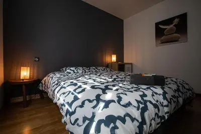 Un ou plusieurs lits dans un hébergement de l'établissement Rare Maison moderne proche centre avec jardin parking gratuit
