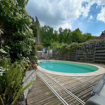 Piscine de l'établissement Chalet 3 Vallées - Piscine & SPA - Haut Standing ou située à proximité