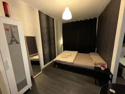 Un ou plusieurs lits dans un hébergement de l'établissement Appartement Centre ville
