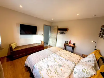 Un ou plusieurs lits dans un hébergement de l'établissement La Chambre aux Bouteilles - Domaine GUETH - Vins d'Alsace et oenotourisme