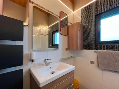 Salle de bains dans l'établissement L'Inattendue - Domaine GUETH - Vins d'Alsace et oenotourisme