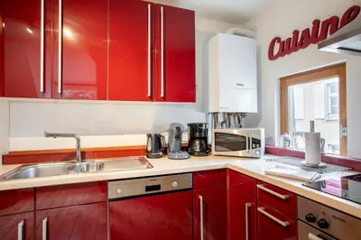 Cuisine ou kitchenette dans l'établissement L'Atypique au coeur du Vignoble