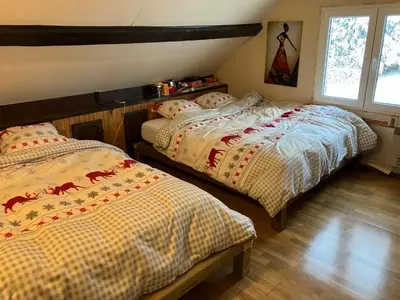 Un ou plusieurs lits dans un hébergement de l'établissement Gîte La Belle Vue, Maison de campagne avec vue magnifique