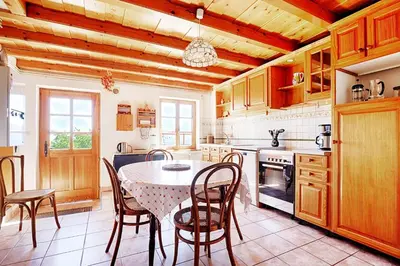 Cuisine ou kitchenette dans l'établissement Gite de la ferme de la Bouille