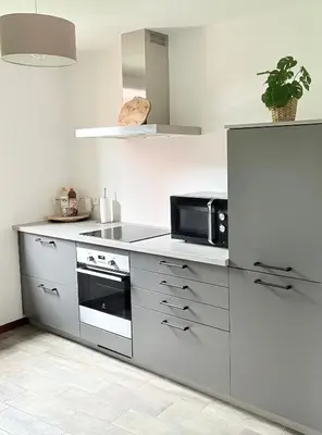 Cuisine ou kitchenette dans l'établissement Gîtes Hassenforder