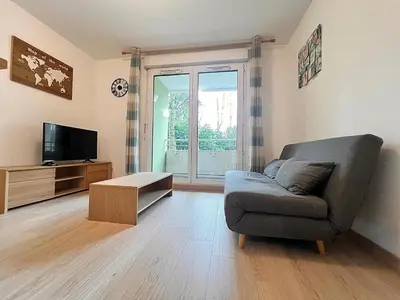 Télévision ou salle de divertissement dans l'établissement Appartement Cosy à Belfort
