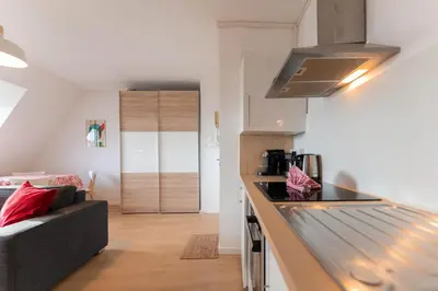 Cuisine ou kitchenette dans l'établissement Le 16 - Parking city center