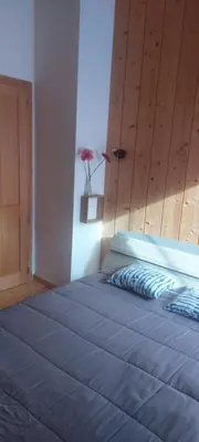 Un ou plusieurs lits dans un hébergement de l'établissement CHALET AU CALME à GERARDMER