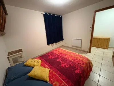 Un ou plusieurs lits dans un hébergement de l'établissement Appartement Cosy