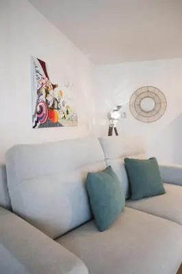 Coin salon dans l'établissement Duplex Échanges complices ,Frontière