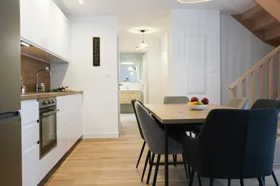 Cuisine ou kitchenette dans l'établissement Duplex Échanges complices ,Frontière