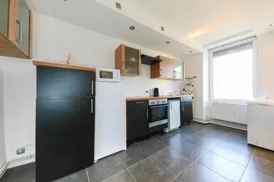 Cuisine ou kitchenette dans l'établissement Cosy 2 - Mulhouse centre