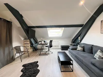Coin salon dans l'établissement Appartement moderne et central