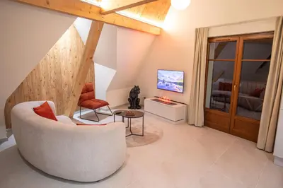 Télévision ou salle de divertissement dans l'établissement Haut Koeur du Château