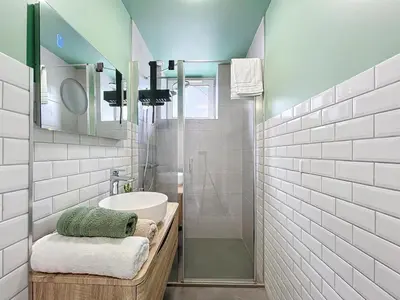 Salle de bains dans l'établissement les Toits de Belfort ville