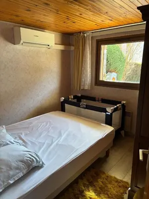 Un ou plusieurs lits dans un hébergement de l'établissement Appartement typique 3 pièces La Bresse Hohneck
