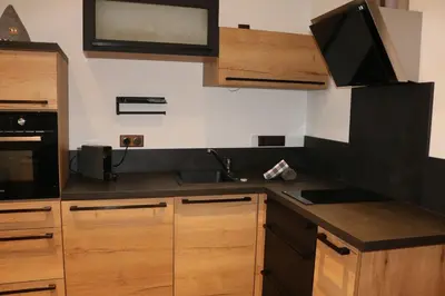 Cuisine ou kitchenette dans l'établissement apartment center Sélestat Le Melimi