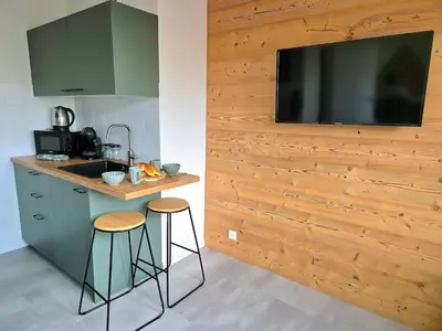 Cuisine ou kitchenette dans l'établissement Le Repaire de la Marmotte