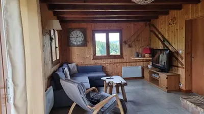 Télévision ou salle de divertissement dans l'établissement Refuge des cimes