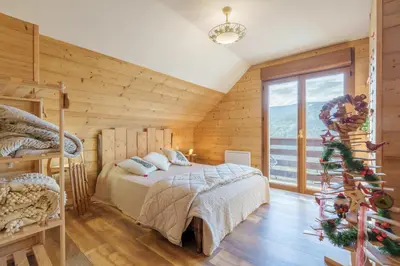Un ou plusieurs lits dans un hébergement de l'établissement Les Genévriers - Vue montagne