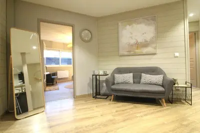 Coin salon dans l'établissement Gite, Maison Chaleureuse