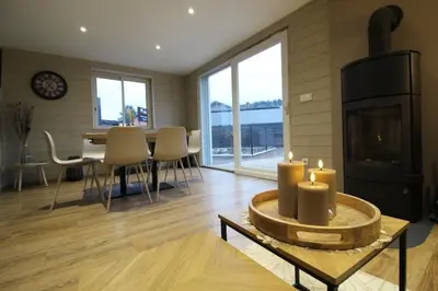 Coin salon dans l'établissement Gite, Maison Chaleureuse