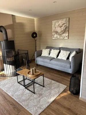 Coin salon dans l'établissement Gite, Maison Chaleureuse