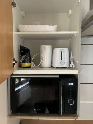 Cuisine ou kitchenette dans l'établissement Le Rustique