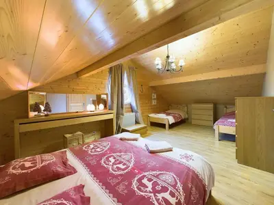 Un ou plusieurs lits dans un hébergement de l'établissement Chalet La Perle Blanche - Spa, Baby-foot, Terrasse